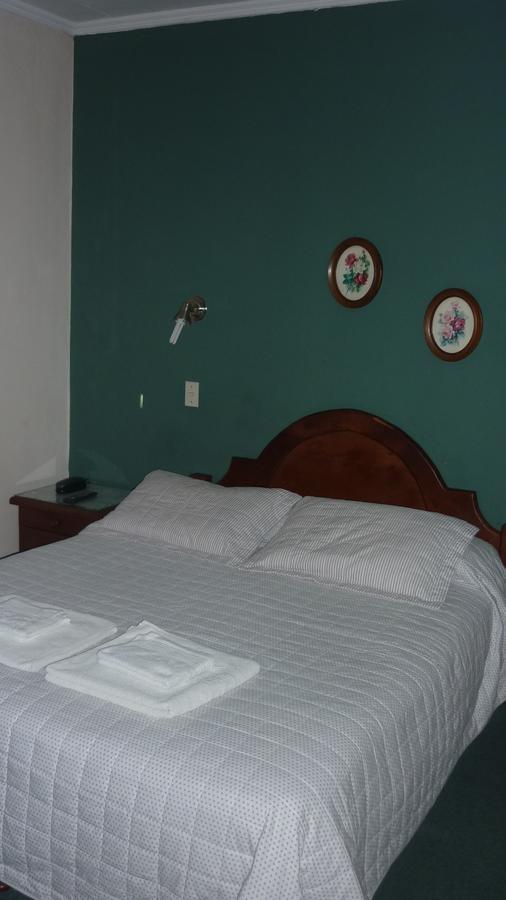 Hotel Alonso Rio Gallegos Bilik gambar